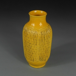 王炳荣黄釉浮雕竹节东瓜瓶,